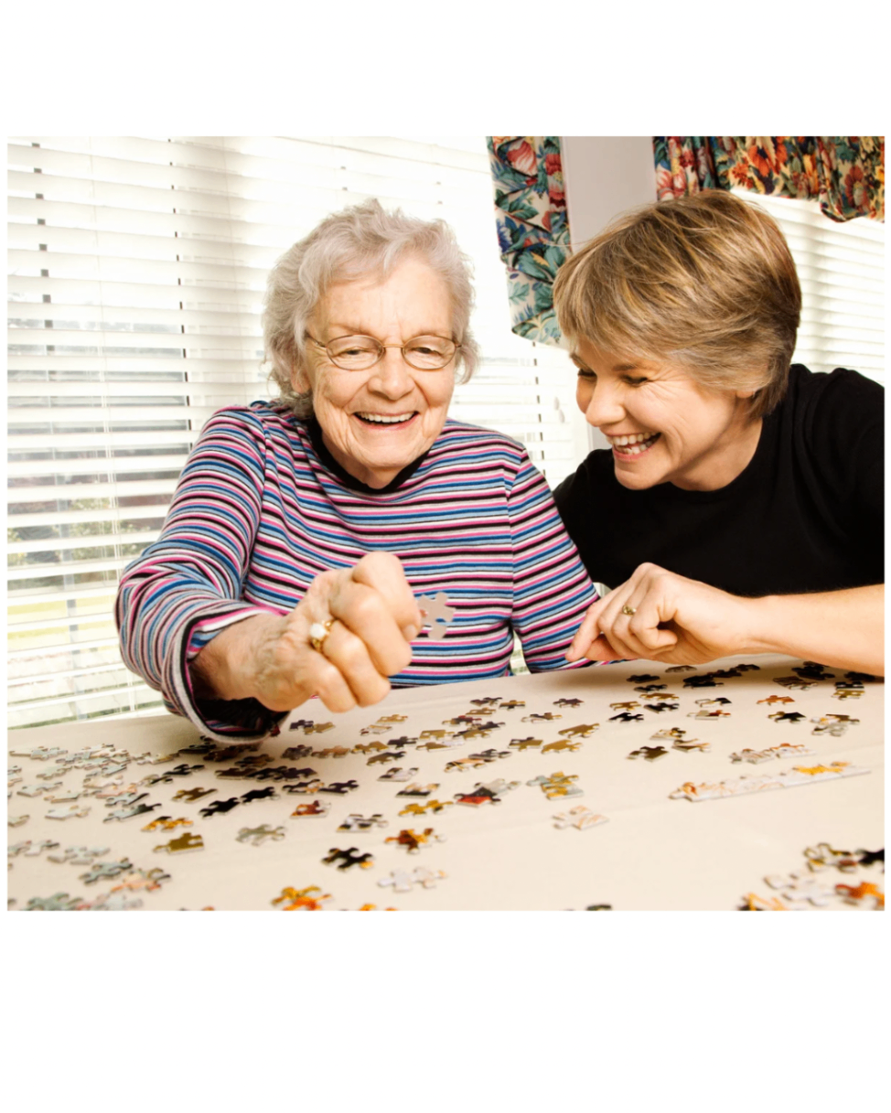 Companion sharing a quiet activity with a senior
